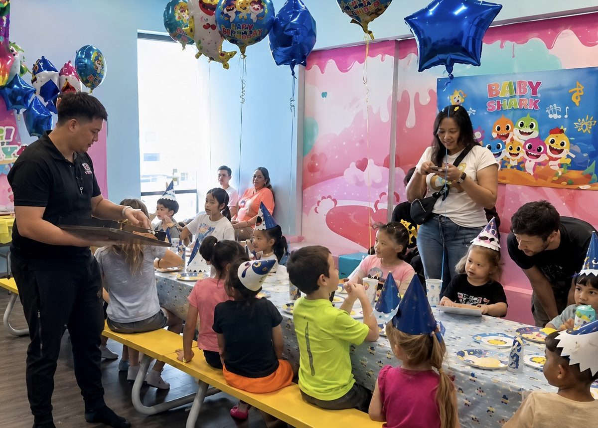 Children celebrating a birthday party in a decorated party room at Hyper Kidz